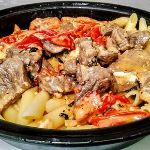 Filet Tips, Roasted Peppers in a Blue Cheese Demi Cream Sauce over Penne. $24