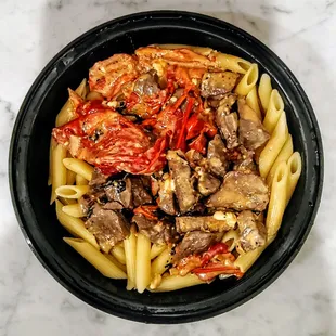 Filet Tips, Roasted Peppers in a Blue Cheese Demi Cream Sauce over Penne. $24
