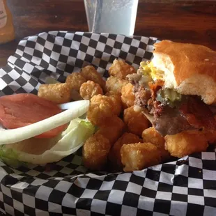 $3 Burger with add-ons and tots.