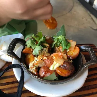 a person eating a bowl of food