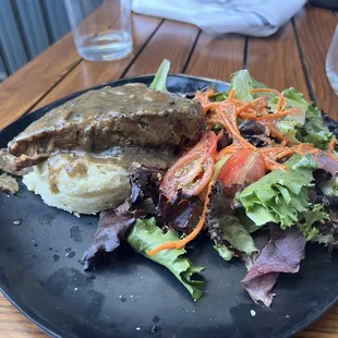 Elk meatloaf with truffle mashed potatoes (nice and light on the truffle) and a tasty salad.