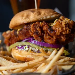 Nashville Hot Fried Chicken Sandwich:
Cole slaw, pickles, red onions, cheddar cheese