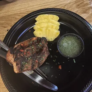 a plate of food with a knife and fork