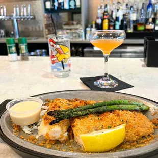 Baked haddock with Ritz crackers and garlic lemon sauce