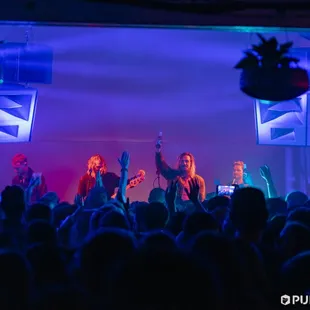 a group of people on stage