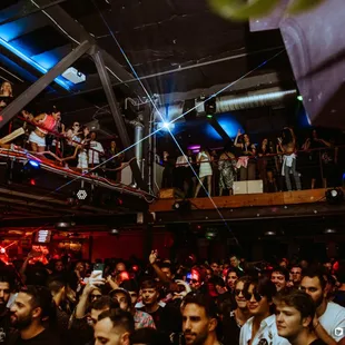 a crowd of people at a nightclub