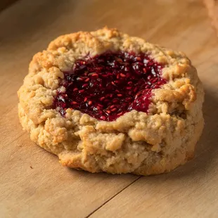 a cookie with raspberry filling