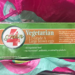 a carton of vegetarian 2 - grade brown eggs