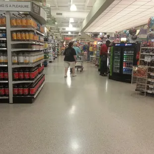 people shopping in a grocery store