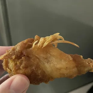 Chicken wings, complete with feathers...