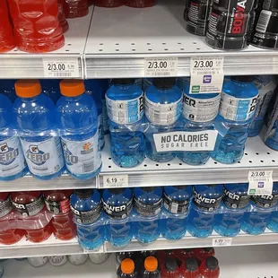 a variety of bottled drinks on a shelf