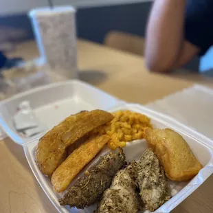 Food from the deli. Grilled Chicken, Potato Wedges, Mac'n Cheese and Cornbread.