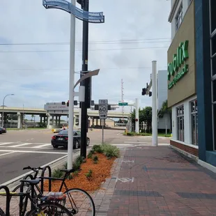 bikes parked on the side of the road