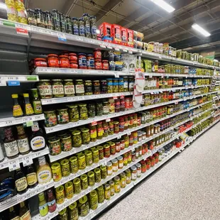 a grocery store aisle with canned food