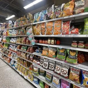 shelves of chips and snacks in a grocery store