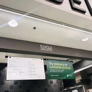 a sign for sushi in a restaurant