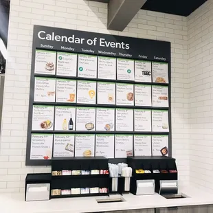 a calendar of events on the wall