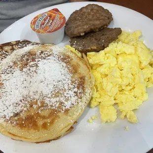 Pancake platter - 2 eggs your way, bacon or sausage and pancakes - $12.99