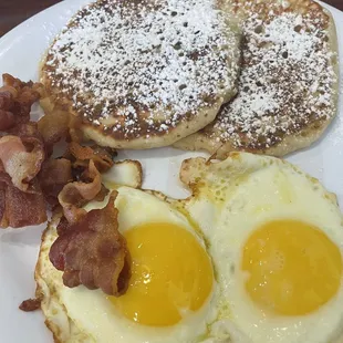 Pancake platter - 2 eggs your way, bacon or sausage and pancakes - $12.99