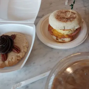 a muffin sandwich with a spider on it