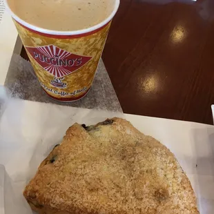 Blueberry scone with a Puccino cappuccino