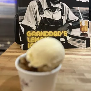  a cup of ice cream on a table