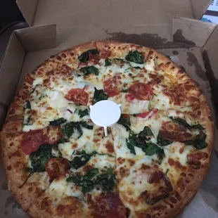 White pizza with pepperoni &amp; spinach added