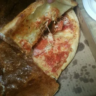 This is my cold $30 calzone I got with the top coming off! Never again!