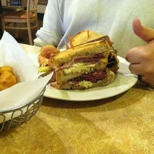 The long lake sandwich (corned beef and pastrami) along with deep fried cauliflower.