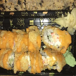 a tray of sushi rolls