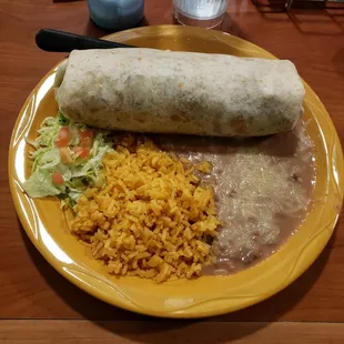 Burrito with steak,chicken and shrimp. Was delicious.
