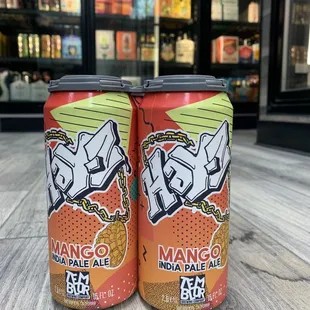 two cans of mango pale ale