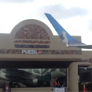 Scooter, tryin' to keep it real out front of the terminal building.