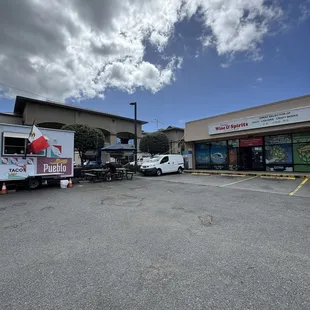 Located in the lot of Young's Wine &amp; Spirits