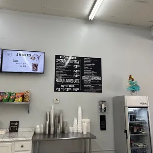 menus on the wall of the restaurant