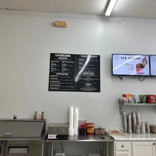 menus on the wall of the restaurant