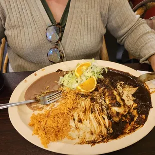 Chicken and cheese mole enchiladas