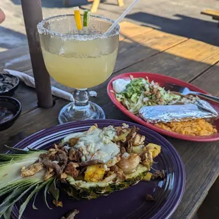 Steak, Chicken, Shrimp with pineapple....topped with cheese..and in a pineapple...amazing!