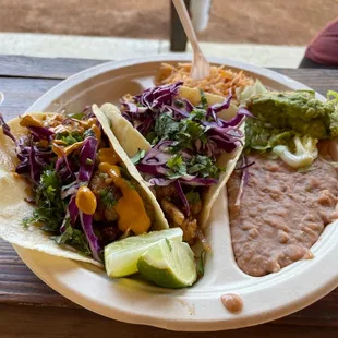 Fish taco plate with rice and beans