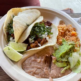 Al pastor taco plate with rice and beans