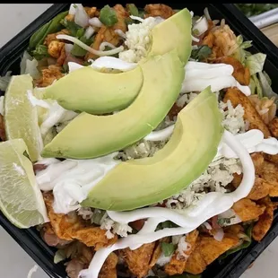avocado on top of a salad