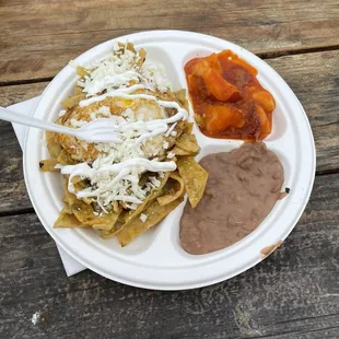 Chilaquiles, refried beans and potatoes