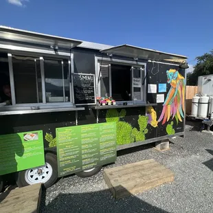 a food truck parked in a parking lot