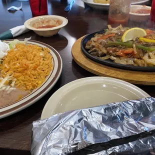 Taco salad, chips and salsa, steak fajita