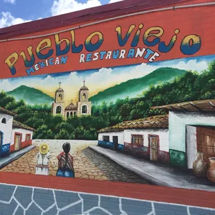 The new mural on the side of the building.