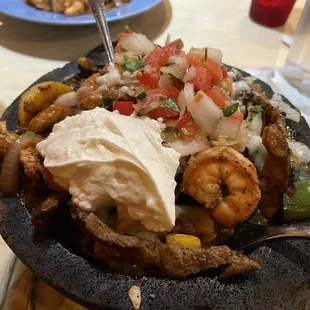 Molcajete Caliente: got the meat trio. So so good and HUGE portion. Came with rice, beans, pico de Gallo and guacamole.