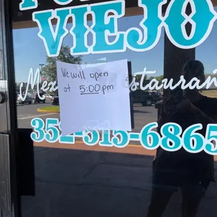 a sign in the window