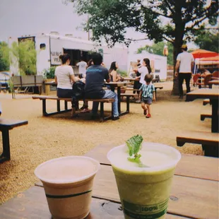 View of the trailer from the seating area with drinks from Cosmic