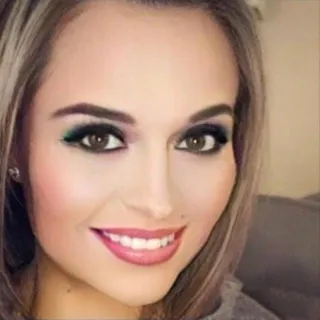 Alma C.
