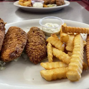 Fish and Chips. Counted 11 fries lol fish over cooked otherwise not bad